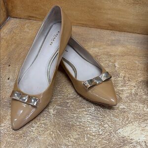 Coach Beige Patent Leather Flats with Metallic Bow